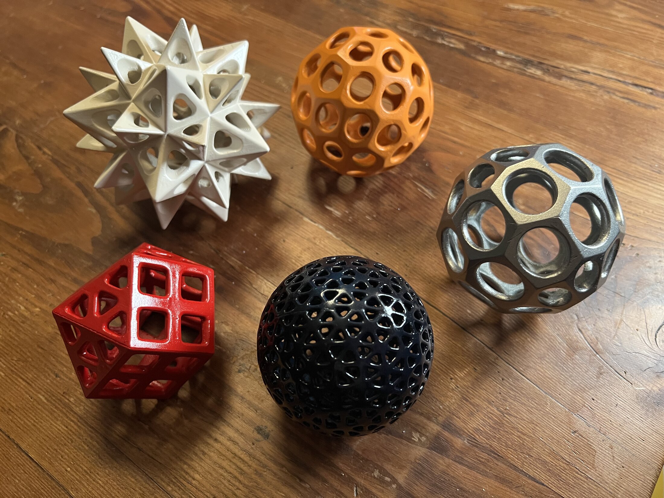 Several printed and painted geometric forms made with Shapemaker